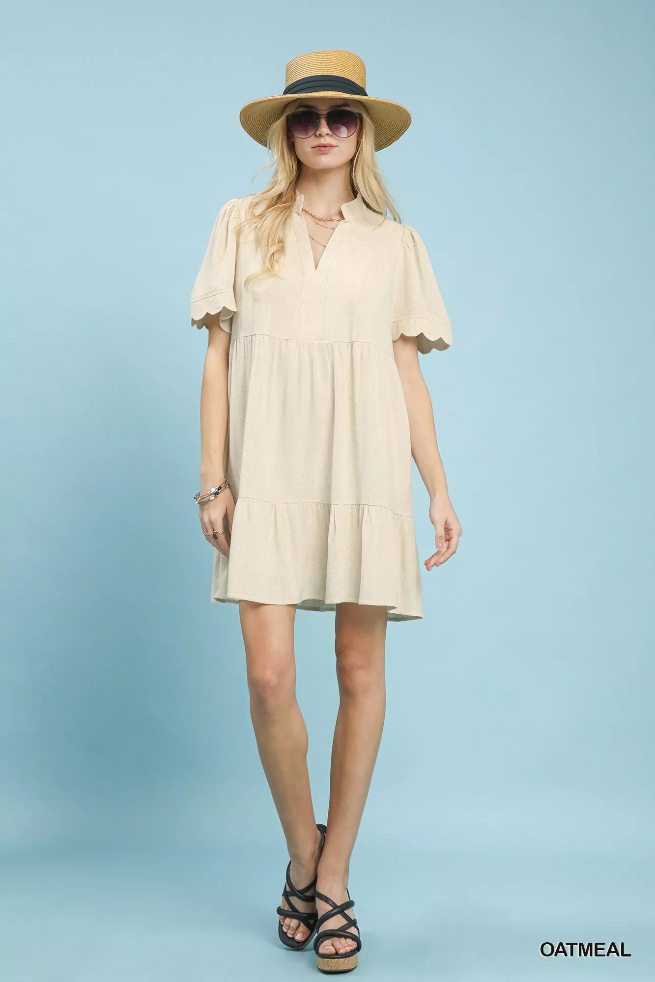 Umgee Linen Tiered Babydoll Dress with Scalloped Sleeves blue background