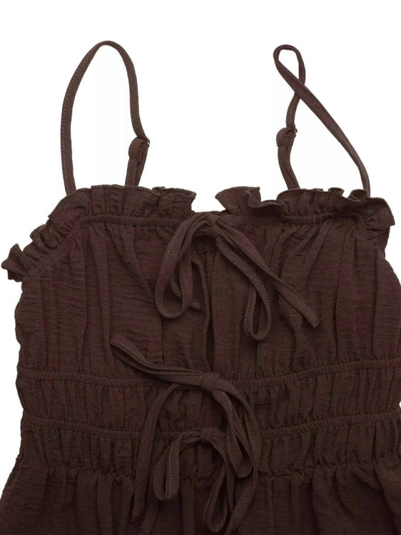 Brown smocked top with thin straps on a white background