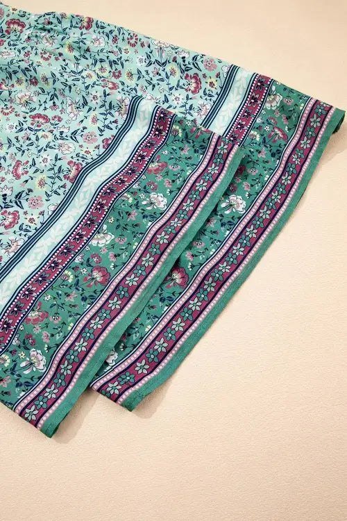 Close-up of a floral-patterned fabric with a beige background
