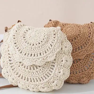 Two crocheted bags, one beige and one brown, on a light background