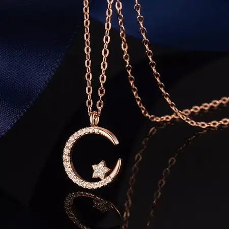 Rose gold crescent moon star pendant necklace with pavé stones