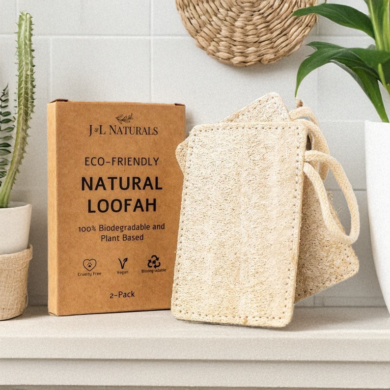 Eco-friendly natural loofah with packaging on a neutral background