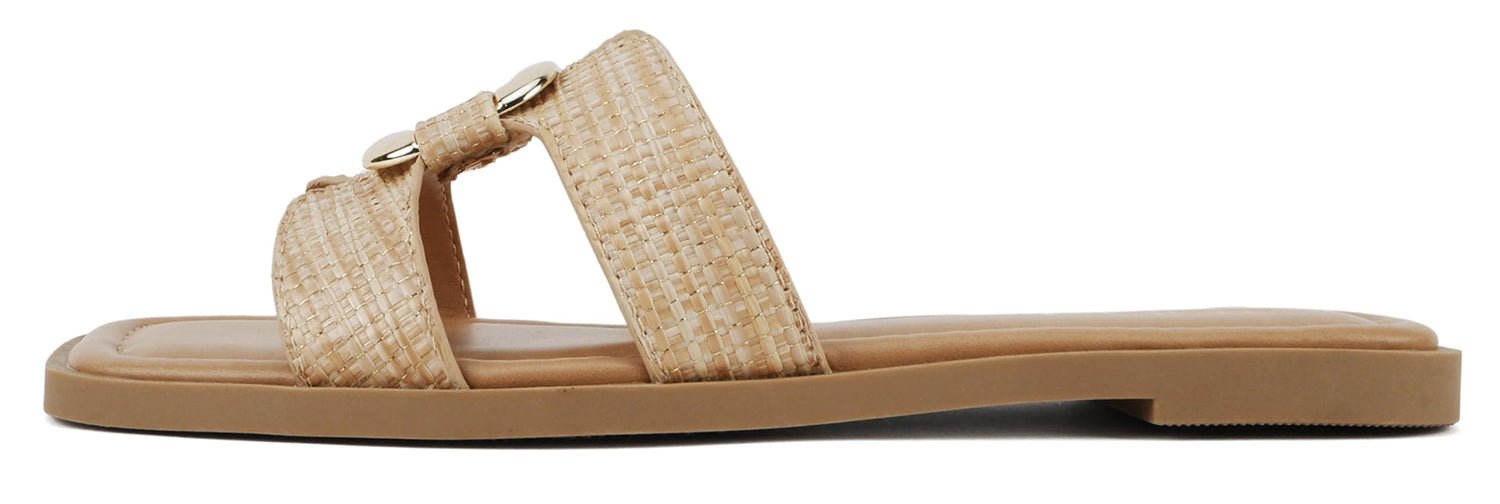 Beige sandal with woven strap on a white background