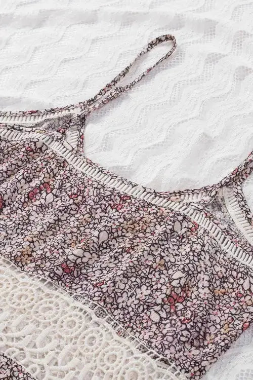 Floral patterned lingerie on a textured white background