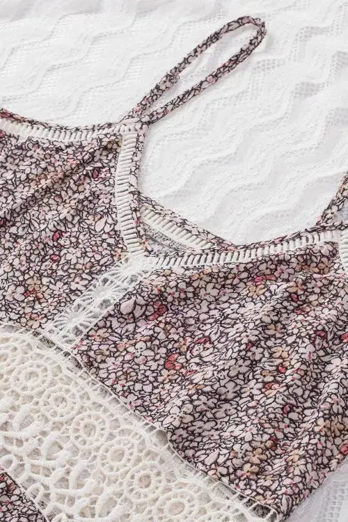 Floral-patterned lingerie set on a textured white background