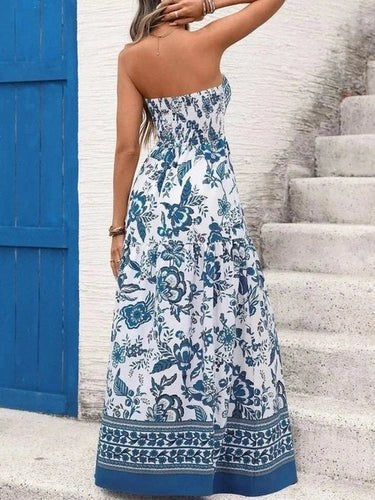 back view of strapless floral maxi dress with elastic waist