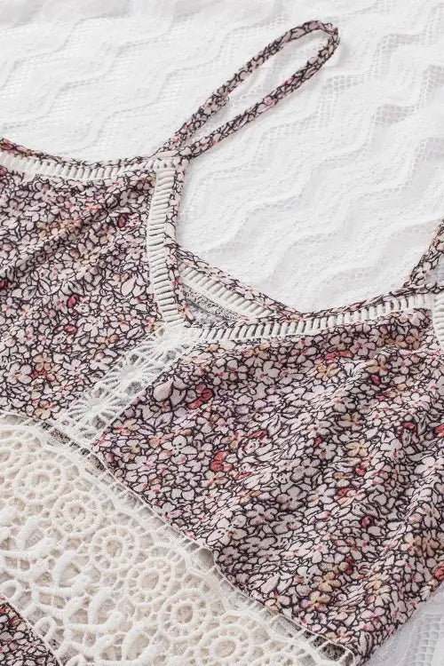 Floral-patterned lingerie set on a textured white background