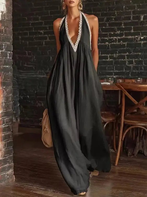 Black plus size halter jumpsuit with wide legs and lace neckline