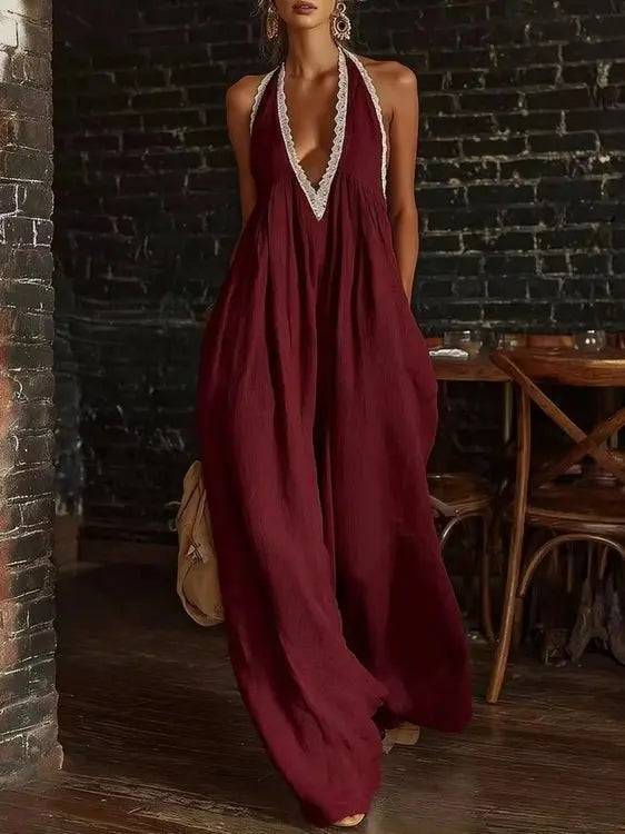 Burgundy full length halter jumpsuit with soft flowing fabric and lace
