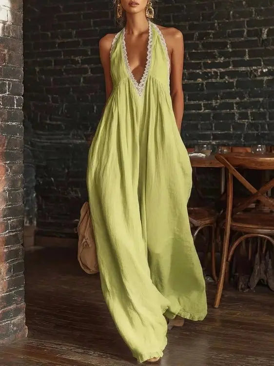 Lime green halter neck jumpsuit with wide legs and lace detailing