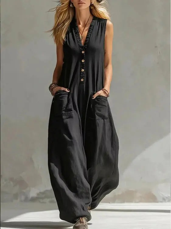 Black V-neck sleeveless wide-leg jumpsuit with wooden-style buttons and loose fit