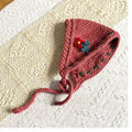 Mauve bohemian crochet headband with red flower and yarn ties on lace