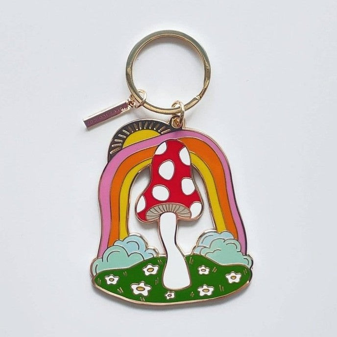 Red polka dot mushroom keychain with rainbow and brass enamel