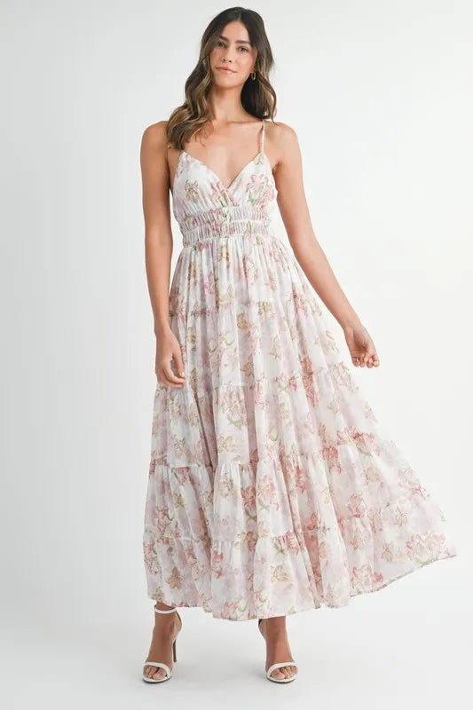 Woman wearing a floral dress on a white background