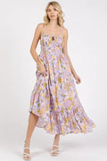 Woman wearing a floral dress on a white background