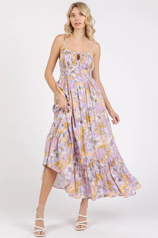 Woman wearing a floral dress on a white background