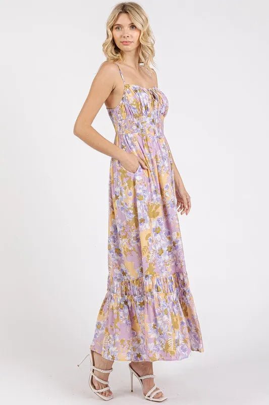 Woman wearing a floral dress on a white background