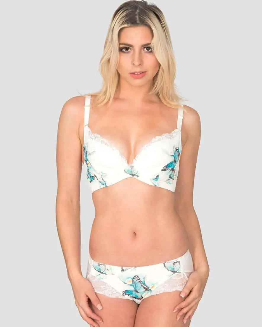 Front view of woman in white lace trim butterfly print underwire bra