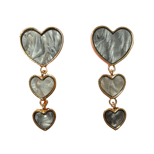 Heart-shaped earrings with marbled design and gold accents on a white background