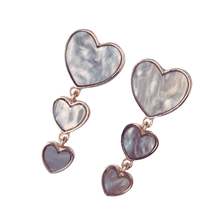 Heart-shaped earrings with rose gold accents on a white background