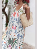 White floral v-neck maxi dress with tropical bird and leaf print