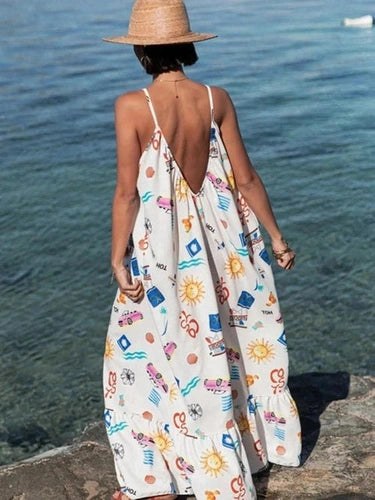 White v-back maxi dress with colorful cars books and sun print