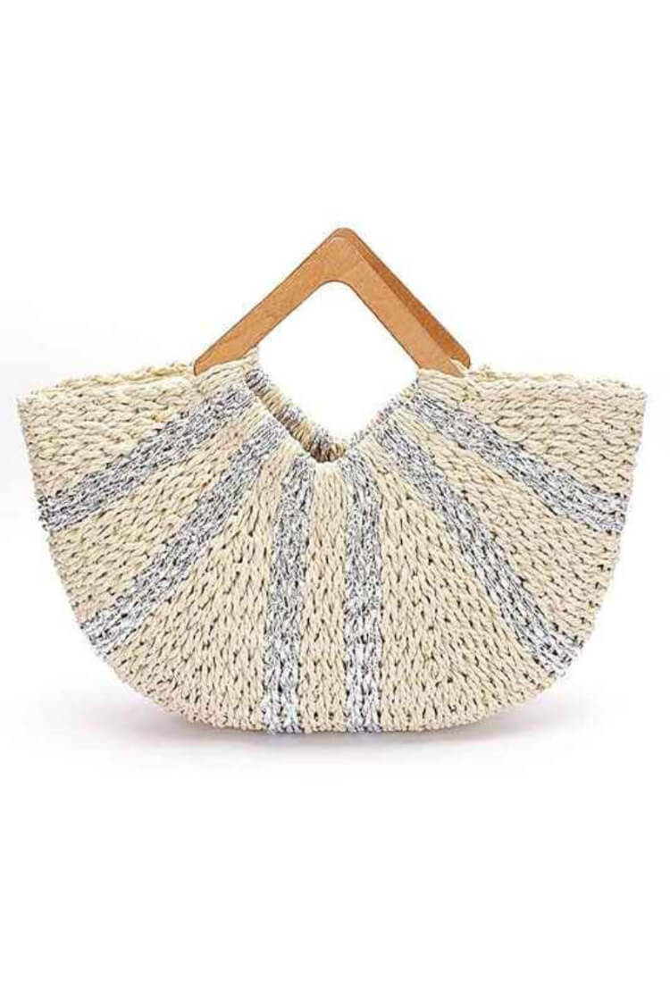 Woven handbag with wooden handle on a white background