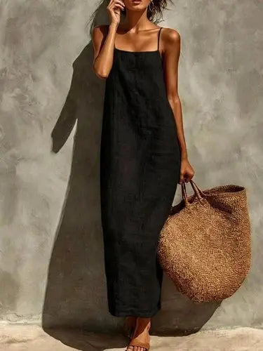 Solid black sleeveless maxi dress with crinkled linen texture and ankle length