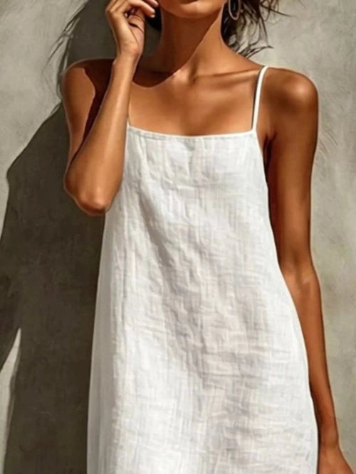 Off-white square neck maxi dress with thin straps and knee-length cut
