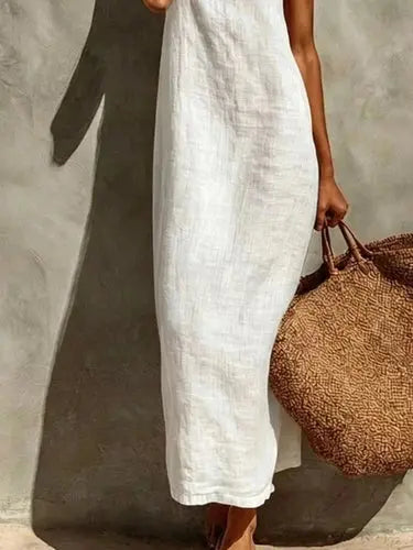 Cream colored off-white sleeveless maxi dress with natural crinkle texture