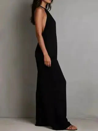 Black sleeveless wide leg jumpsuit with halter neckline and open back
