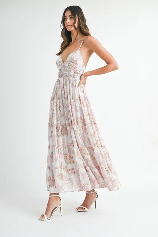 Woman wearing a floral dress on a white background