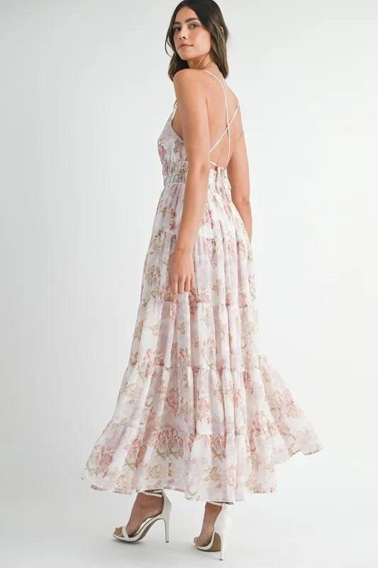 Woman wearing a floral dress on a white background