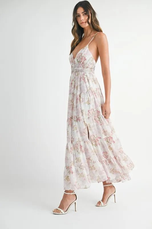Woman wearing a floral dress on a white background