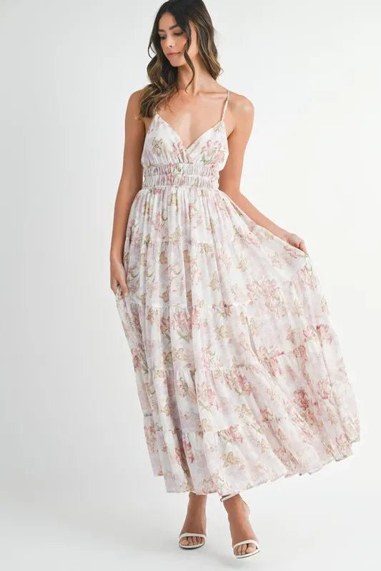 Woman wearing a floral dress on a white background