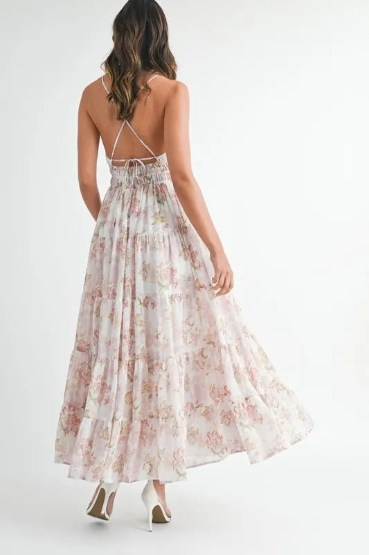 Woman wearing a floral dress on a white background