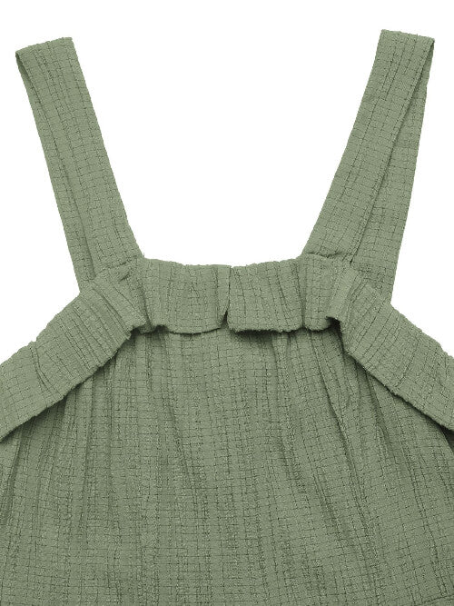 Green checkered dress with straps on a white background
