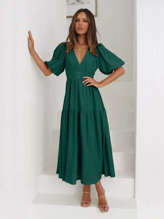 Deep dark green tiered surplice midi dress with half sleeves and smocked waist