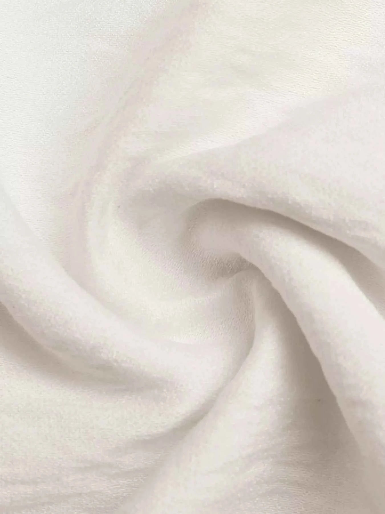Close-up of white fabric with a soft texture