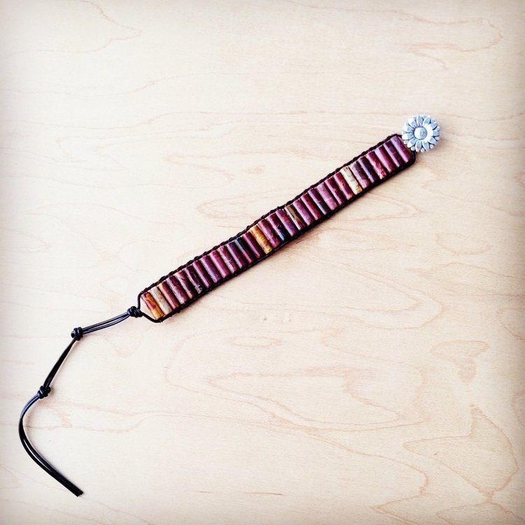 Purple and red gradient stone beads on dark cord bracelet