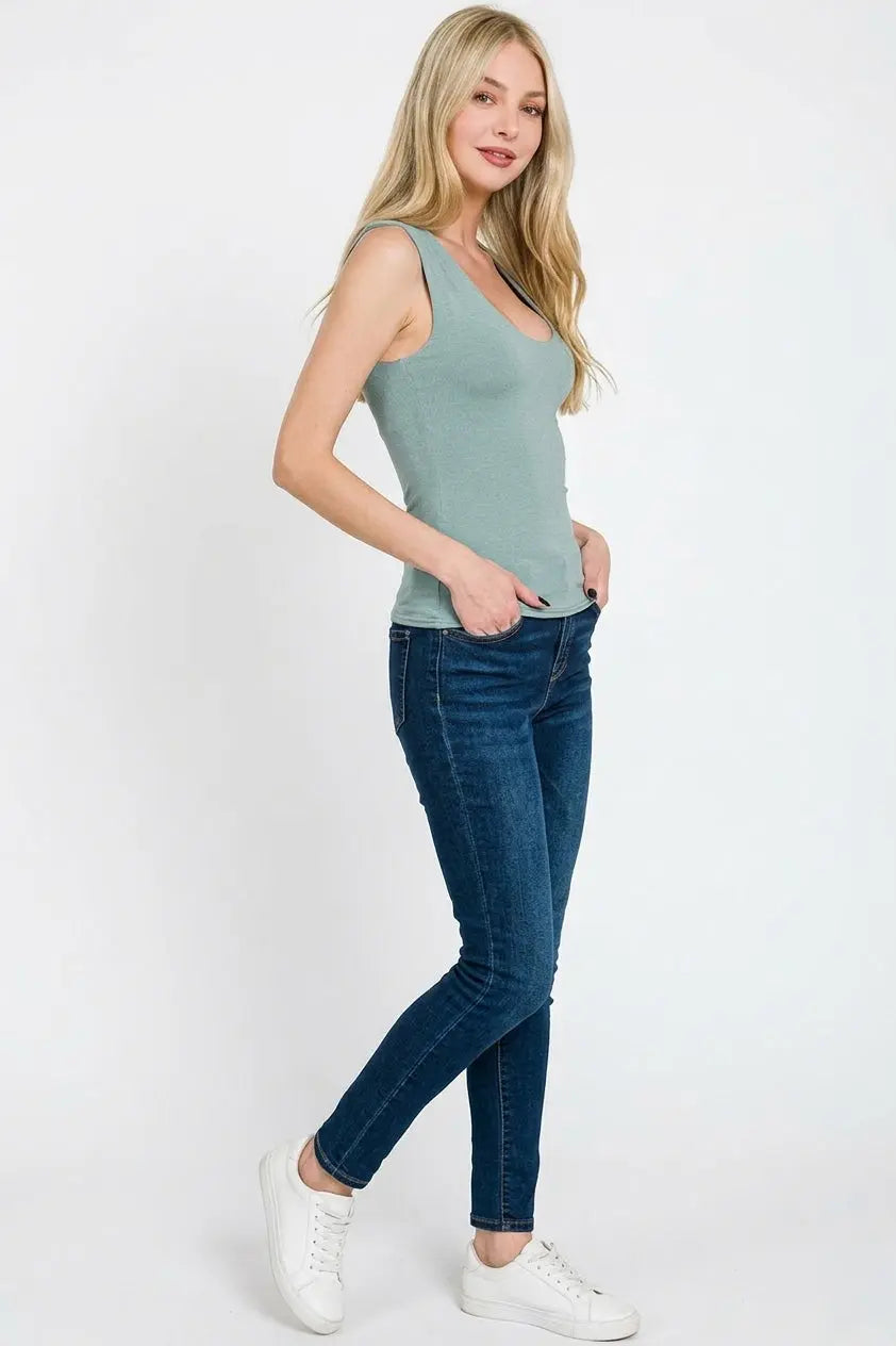 Blue grey sleeveless tank top side profile fit with dark jeans