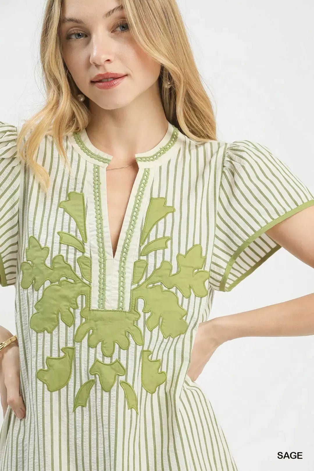 Umgee Stripe Midi Dress with Lace Trim - Salty Season LLC Woman wearing a green and white dress with floral embroidery on a white background